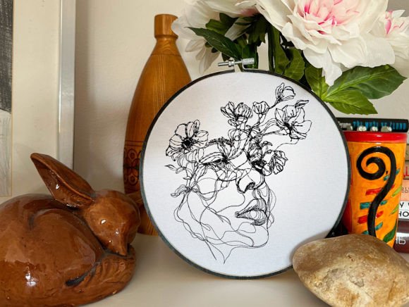 Reviewing the Lady Face One-line Embroidery Design